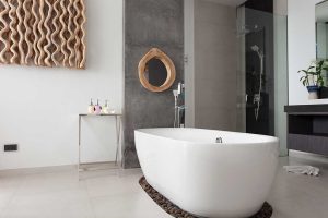 Modern new bathroom interior design with white stone bathtub